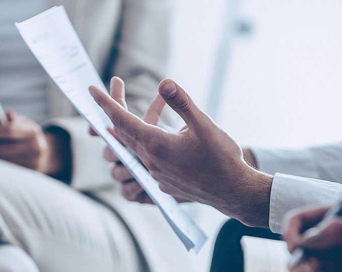 person holding paper