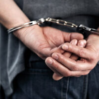 handcuffed handcuffed