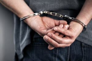 handcuffed handcuffed